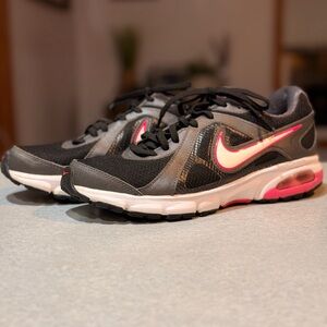 Women's Nike Air Dictate 2 running shoes in black, grey, and pink